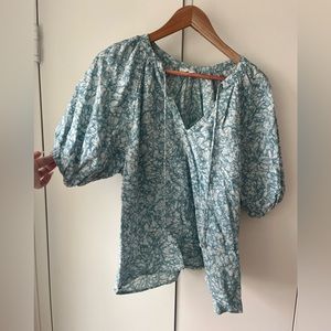 House Of Harlow Blue and white peasant short sleeve blouse.